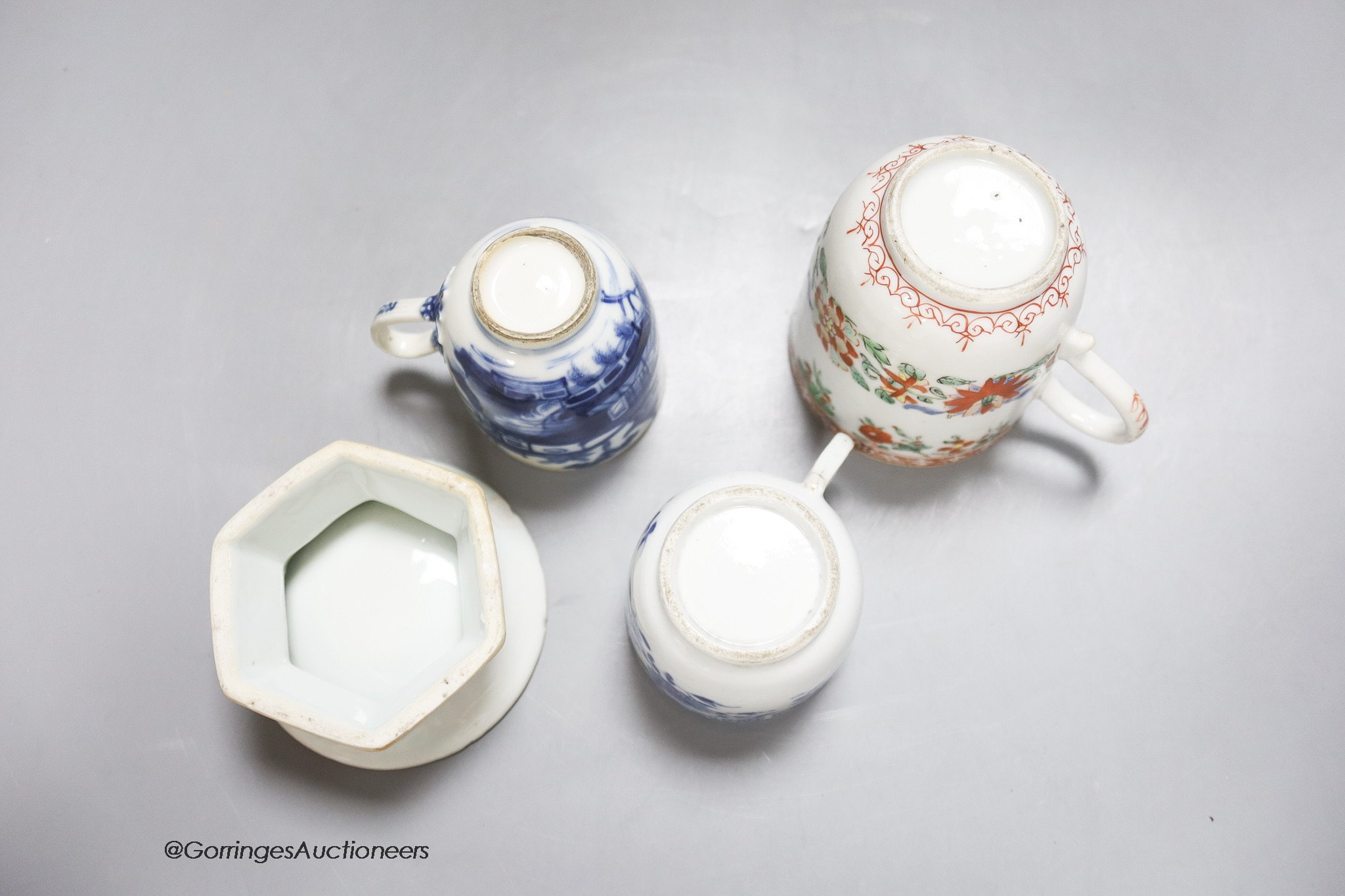 Three Chinese export coffee cups and a similar salt cellar, 18th century